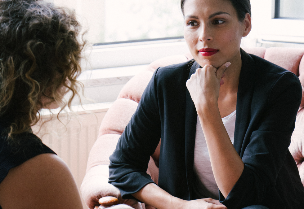 Two HR professionals in a career coaching meeting.